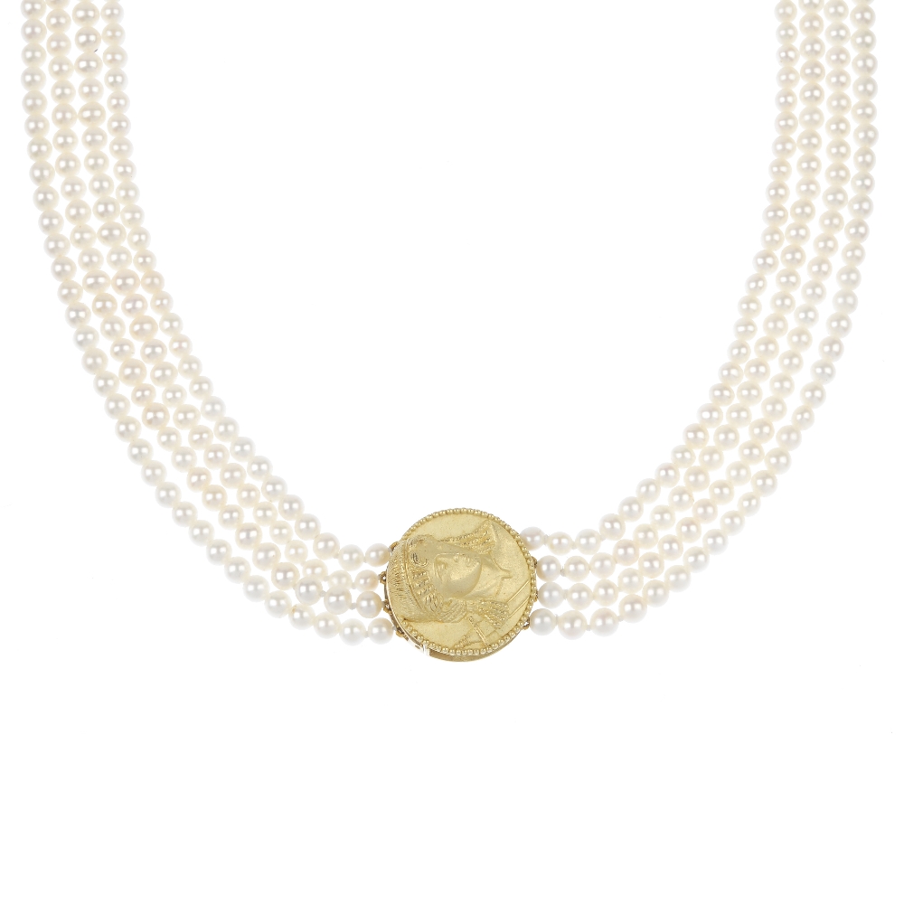 A cultured pearl four-row necklace. Designed as a series of cultured pearls, to the circular-shape