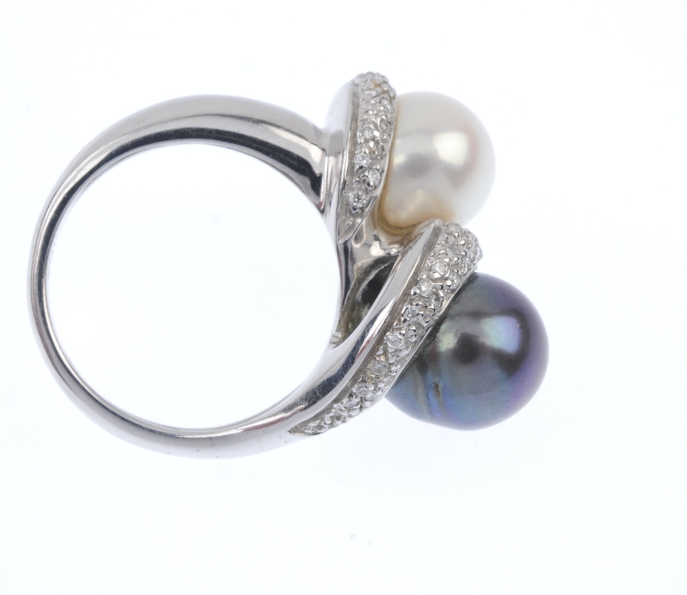 A cultured pearl and diamond dress ring. The black and cream cultured pearls, within a pave-set - Image 4 of 4