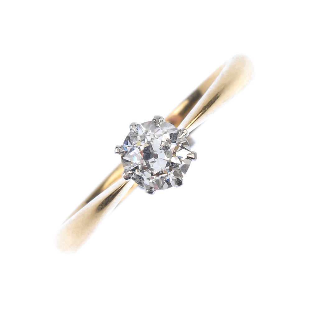 An interchangeable diamond single-stone ring, stickpin and stud. Comprising an old-cut diamond