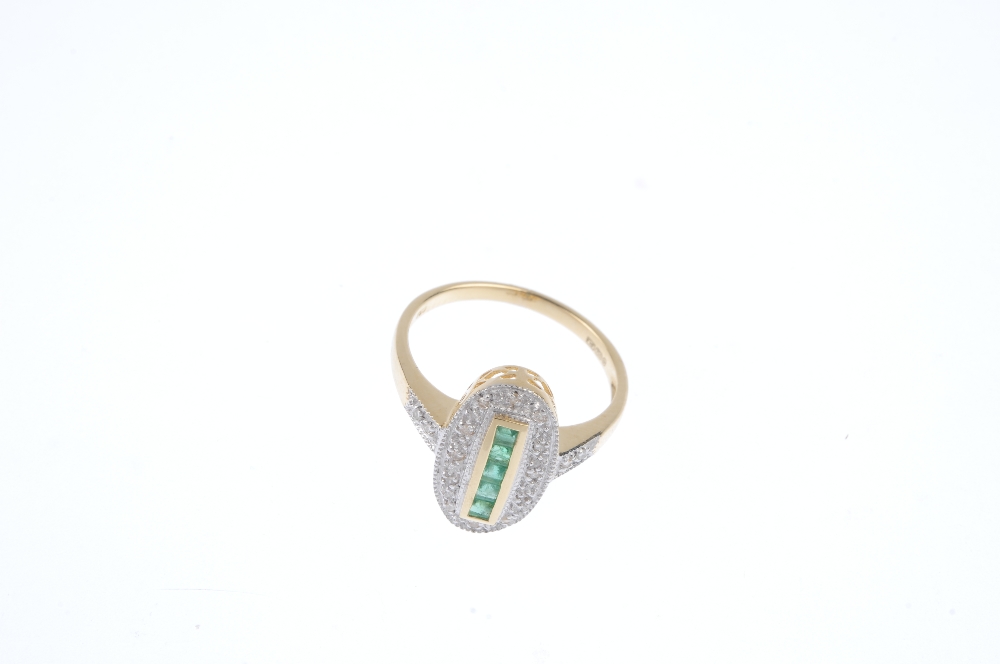 An 18ct gold emerald and diamond ring. The square-shape emerald line, within a channel-setting, to - Image 2 of 4