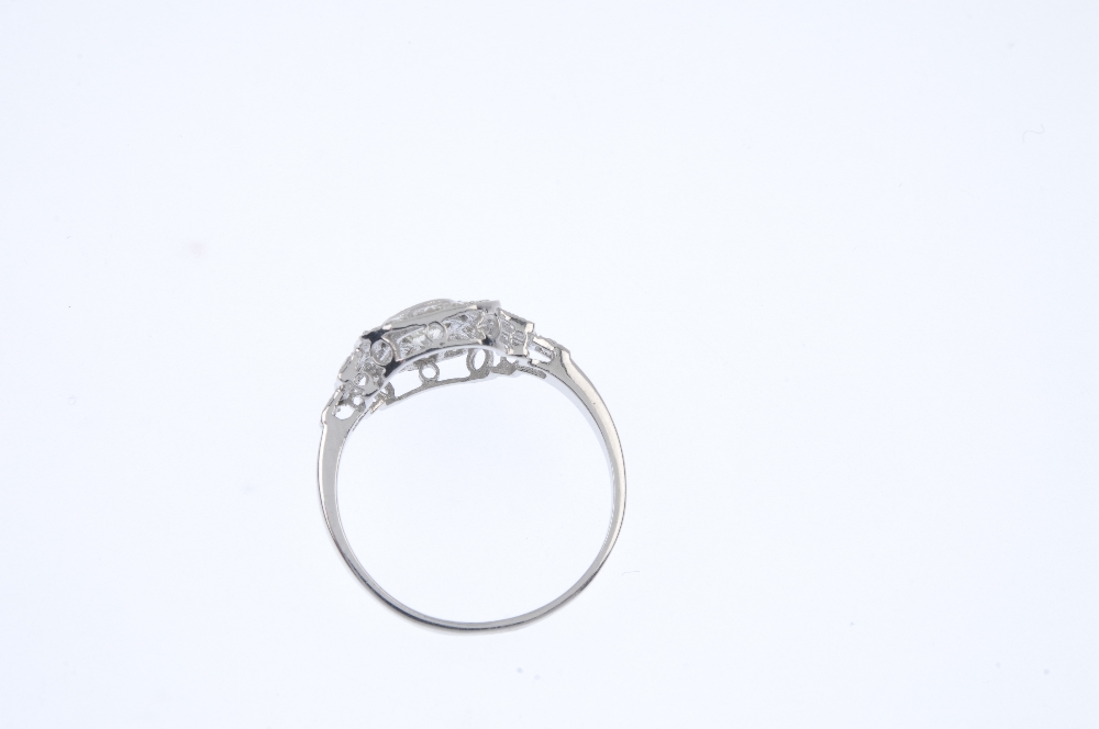 A diamond dress ring. The brilliant-cut diamond collet, to the similarly-cut diamond panel and - Image 3 of 4