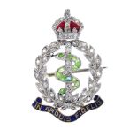 An early 20th century diamond, gem-set and enamel Royal Army Medical Corps brooch. The green gem and