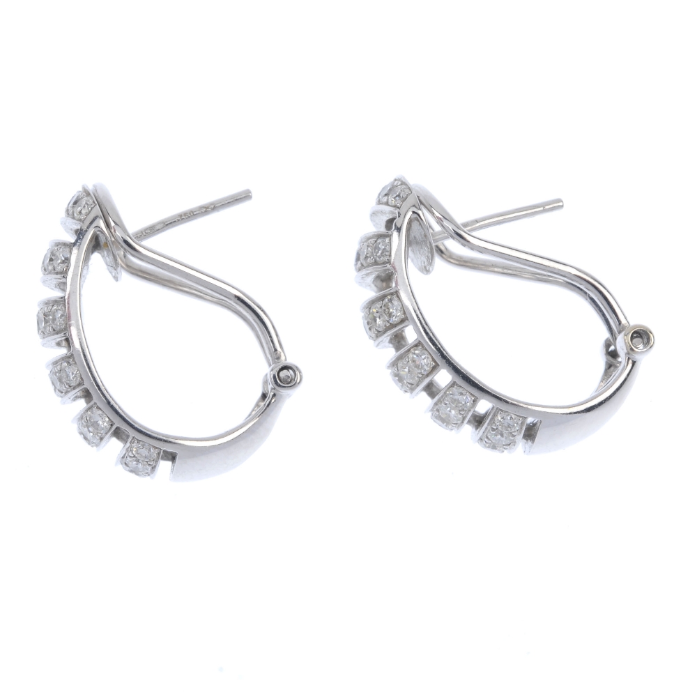 A pair of diamond earrings. Each designed as a series of brilliant-cut diamond curved lines. - Image 2 of 2