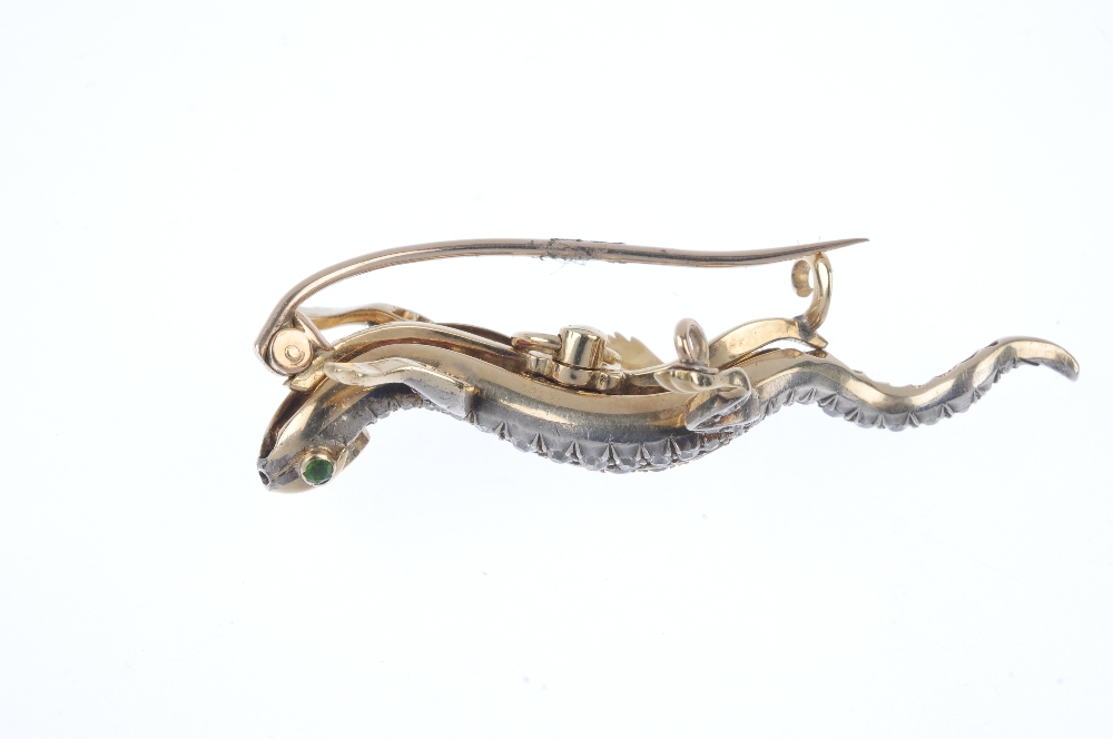 An early 20th century silver and gold, ruby, diamond and demantoid garnet lizard brooch. The - Image 2 of 3