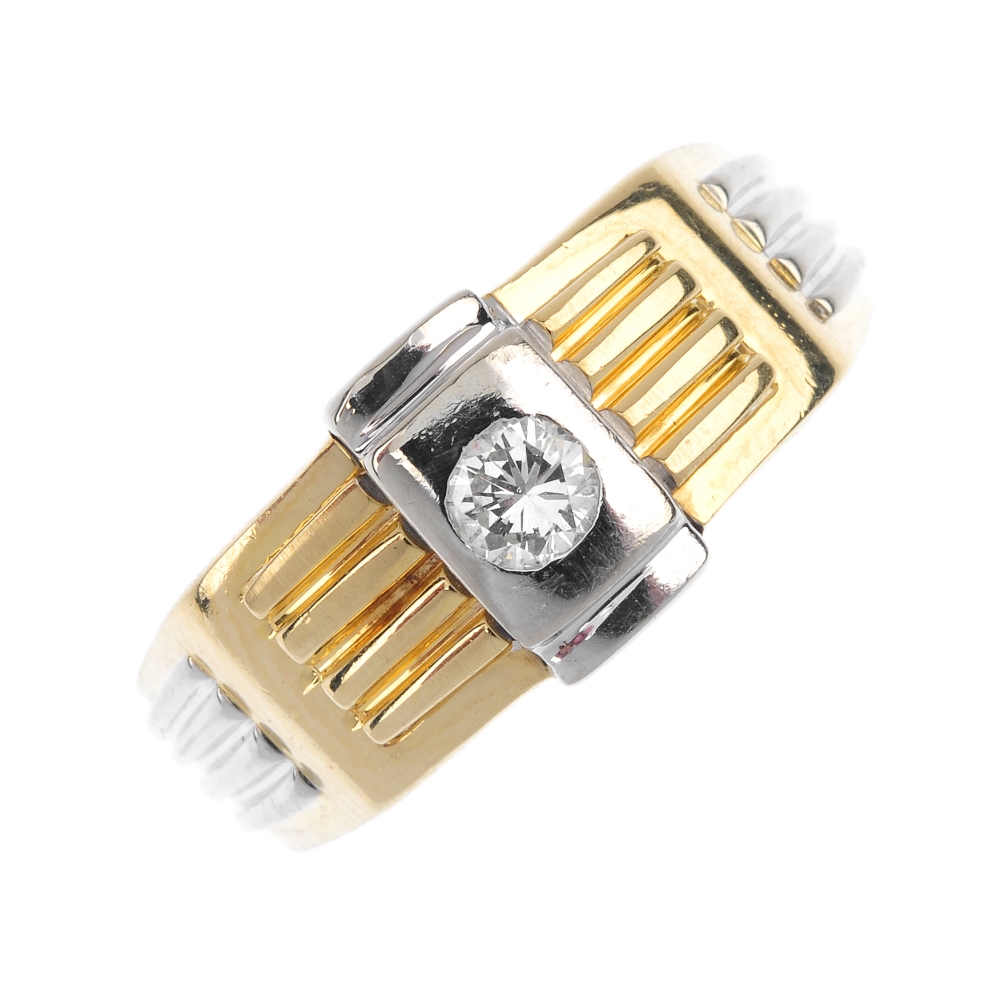 A gentleman's 18ct gold diamond ring. Of bi-colour design, the brilliant-cut diamond, inset to a