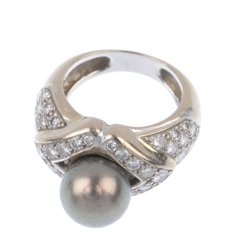 A cultured pearl and diamond dress ring. The grey cultured pearl, measuring approximately 10mms, - Image 2 of 4