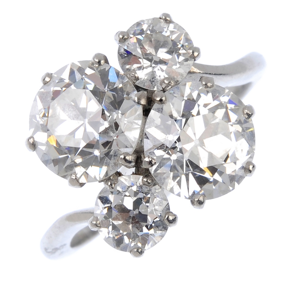 A diamond four-stone dress ring. The principal old-cut diamonds, weighing 2.31cts and 1.91cts