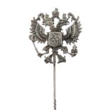 A stickpin. Designed as a Russian double-headed eagle, to the spiral accent pin. 84 zolotnik mark,