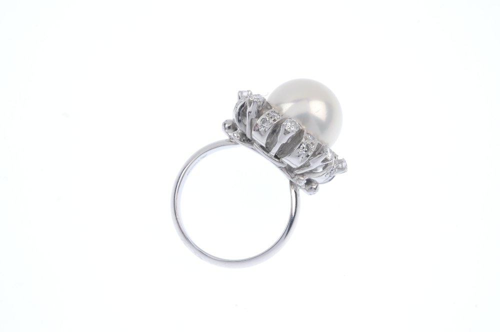 A cultured pearl and and diamond dress ring. The cultured pearl, measuring 12.1mms, within a - Image 4 of 4