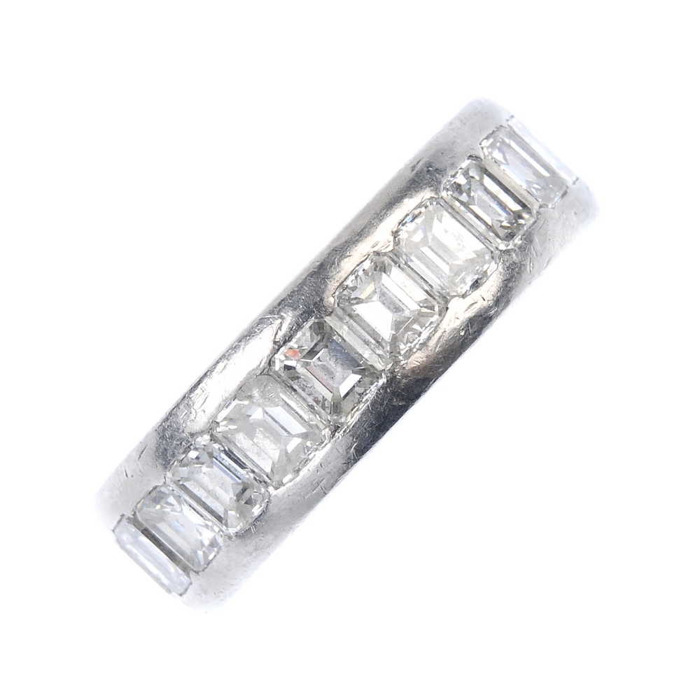 HIRSCH - a diamond full-circle eternity ring. Designed as a series of rectangular-shape diamonds,