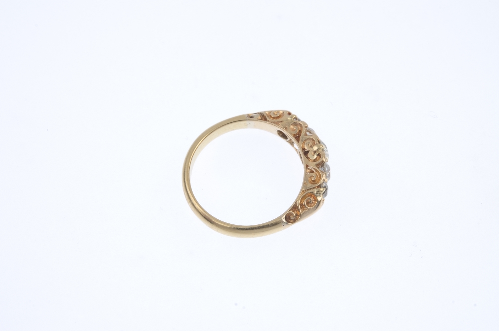 An Edwardian 18ct gold diamond five-stone ring. The graduated old and brilliant-cut diamond line, to - Image 4 of 4