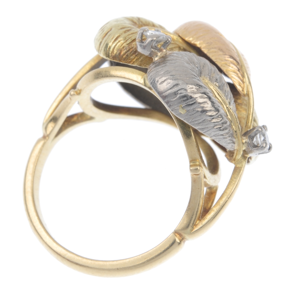 A diamond dress ring. Designed as a series of tri-colour overlapping feathers, with brilliant-cut - Image 4 of 4