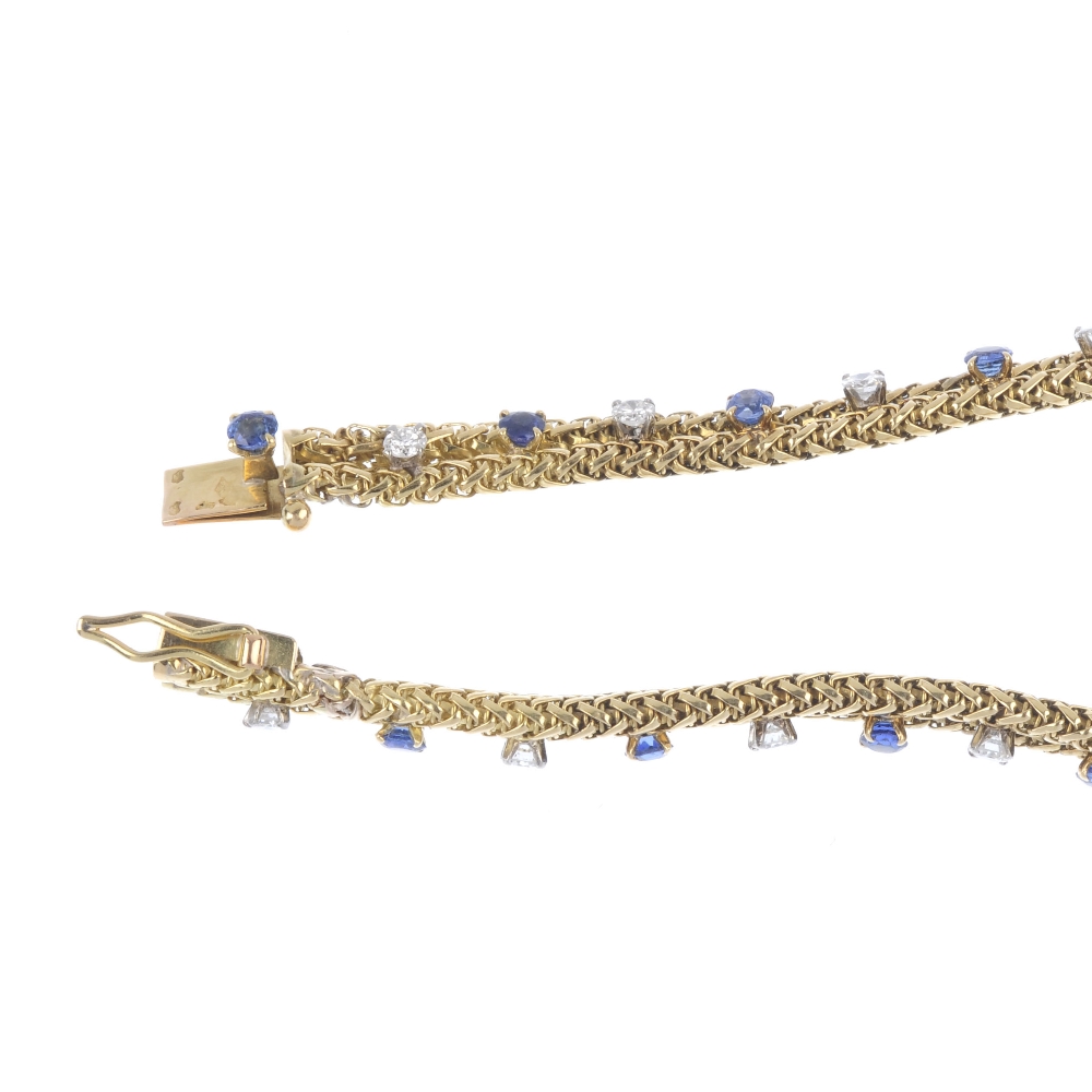 A sapphire and diamond bracelet. The alternating circular-shape sapphire and brilliant-cut diamonds, - Image 3 of 3