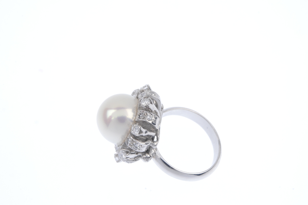 A cultured pearl and and diamond dress ring. The cultured pearl, measuring 12.1mms, within a - Image 3 of 4