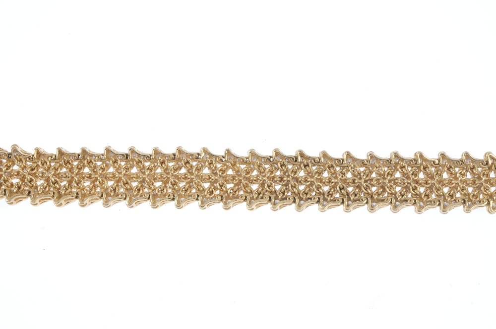 An 18ct gold diamond articulated bracelet. Comprising three rows of pave-set diamond chevron - Image 2 of 3