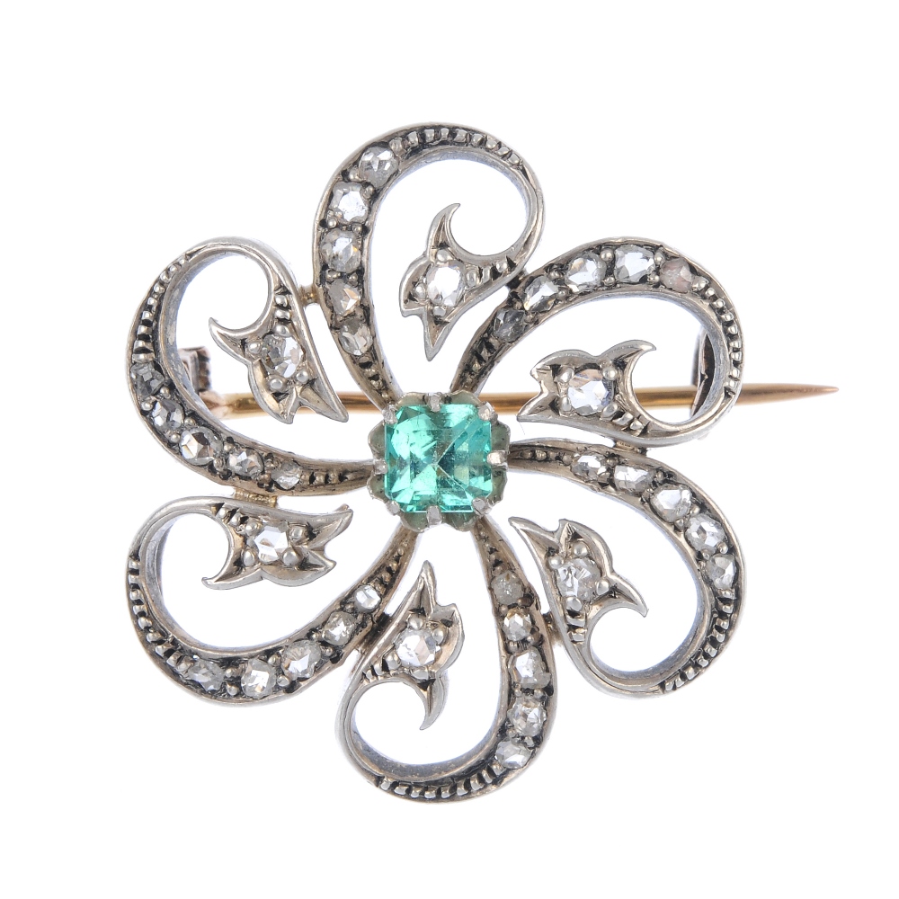 A late 19th century silver and gold diamond and emerald brooch. The square-shape emerald, to the