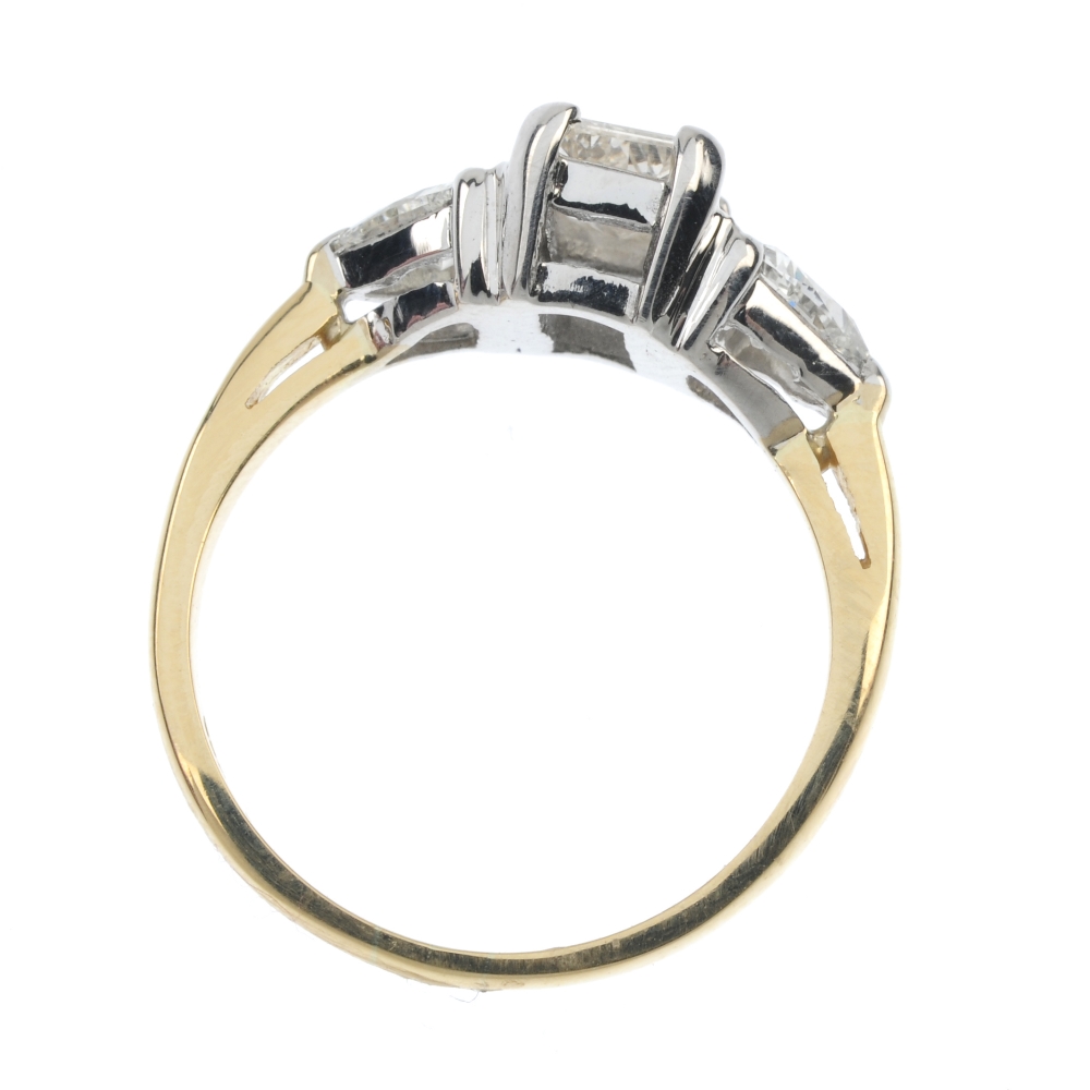 An 18ct gold diamond three-stone ring. The rectangular-shape diamond, to the triangular-shape - Image 4 of 4