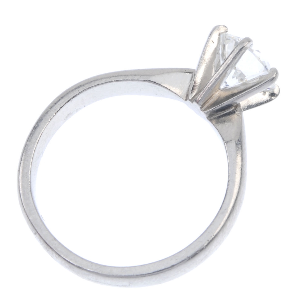 A platinum diamond single-stone ring. The brilliant-cut diamond, to the plain band. Estimated - Image 4 of 4