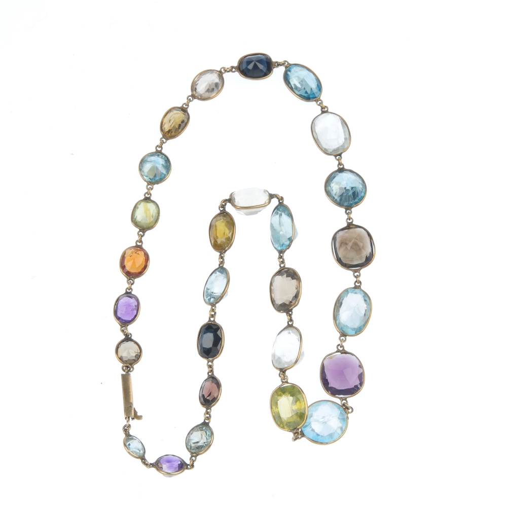 A multi gem-set necklace. The graduated vari-shape gem-set line, consisting of vari-hue zircon, - Image 3 of 3