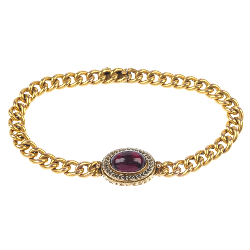 A late 19th century gold garnet and enamel bracelet. The foil-back oval garnet cabochon, within a