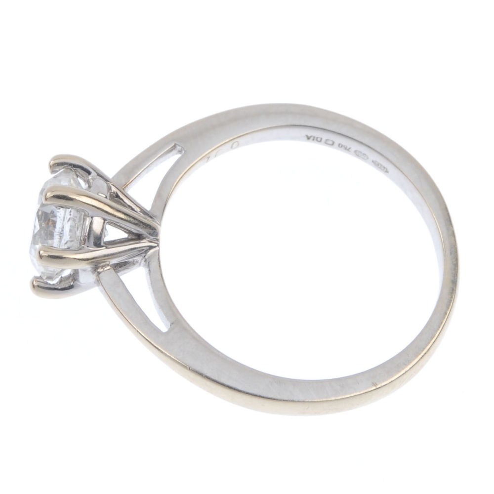 An 18ct gold diamond single-stone ring. The brilliant-cut diamond, to the tapered shoulders and - Image 3 of 4