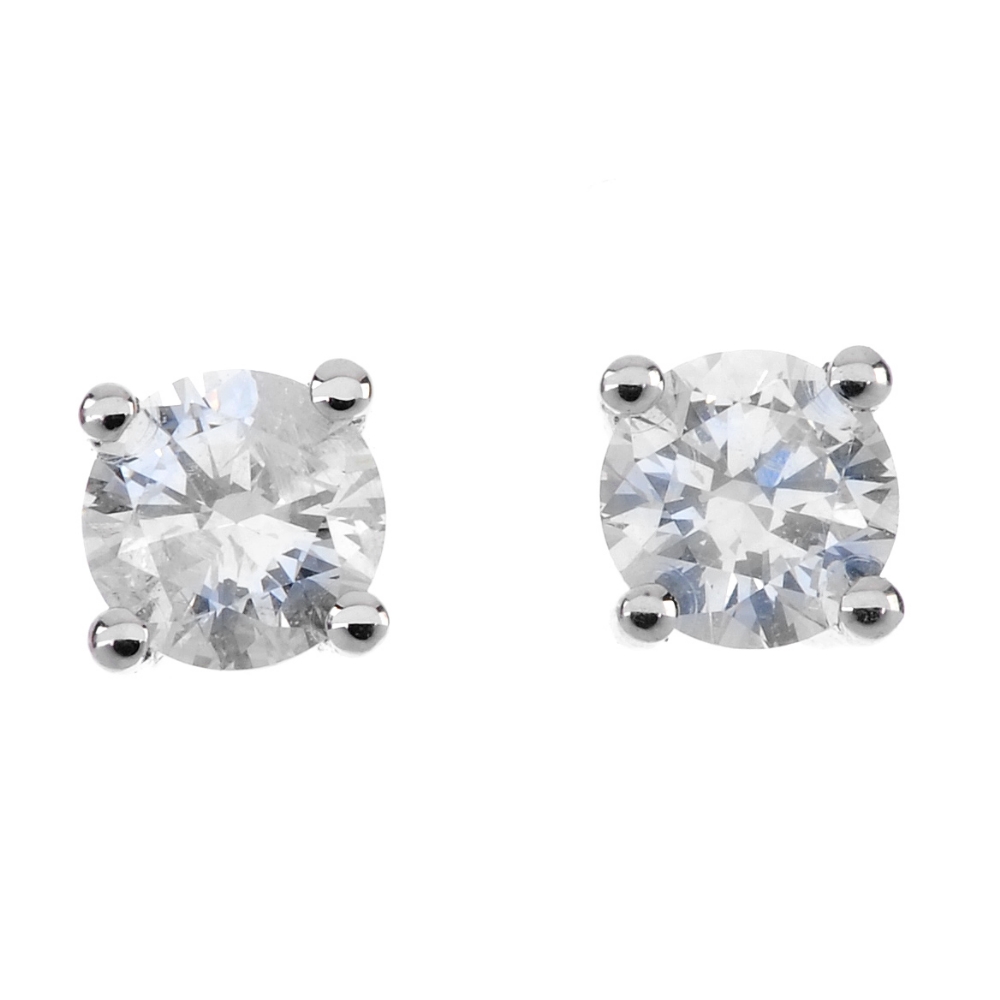 A pair of 18ct gold brilliant-cut diamond ear studs. Total diamond weight 0.50ct, stamped to