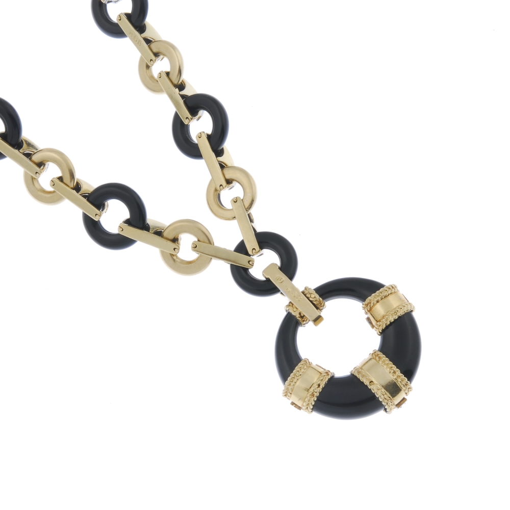 An onyx and diamond necklace. The tapered onyx hoop pendant, with overlaid single-cut diamond line - Image 2 of 3