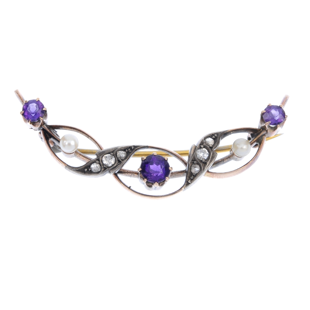An early 20th century silver and gold, diamond and gem-set crescent brooch. The alternating