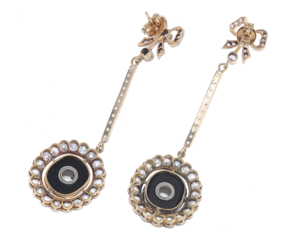 A pair of diamond and onyx ear pendants. Each designed as a cushion-shape onyx cabochon and old- - Image 2 of 2