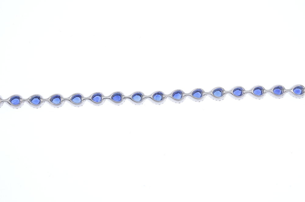 * A sapphire and diamond bracelet. Designed as a series of pear-shape sapphire and brilliant-cut - Image 2 of 3