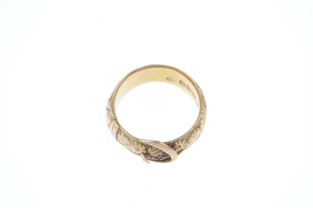 A late Victorian 18ct gold buckle ring. Designed as a belt, with floral texture. Hallmarks for - Image 2 of 3