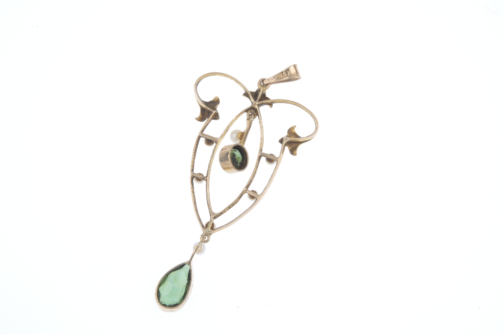 An early 20th century 9ct gold tourmaline and seed pearl pendant. Of openwork design, the pear-shape - Image 2 of 2