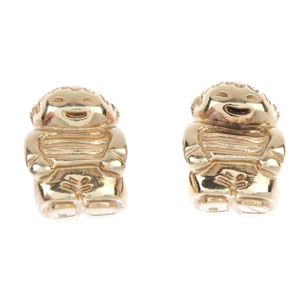 PANDORA - a 14ct gold band ring and two 14ct gold charms. The ring designed as a plain band,