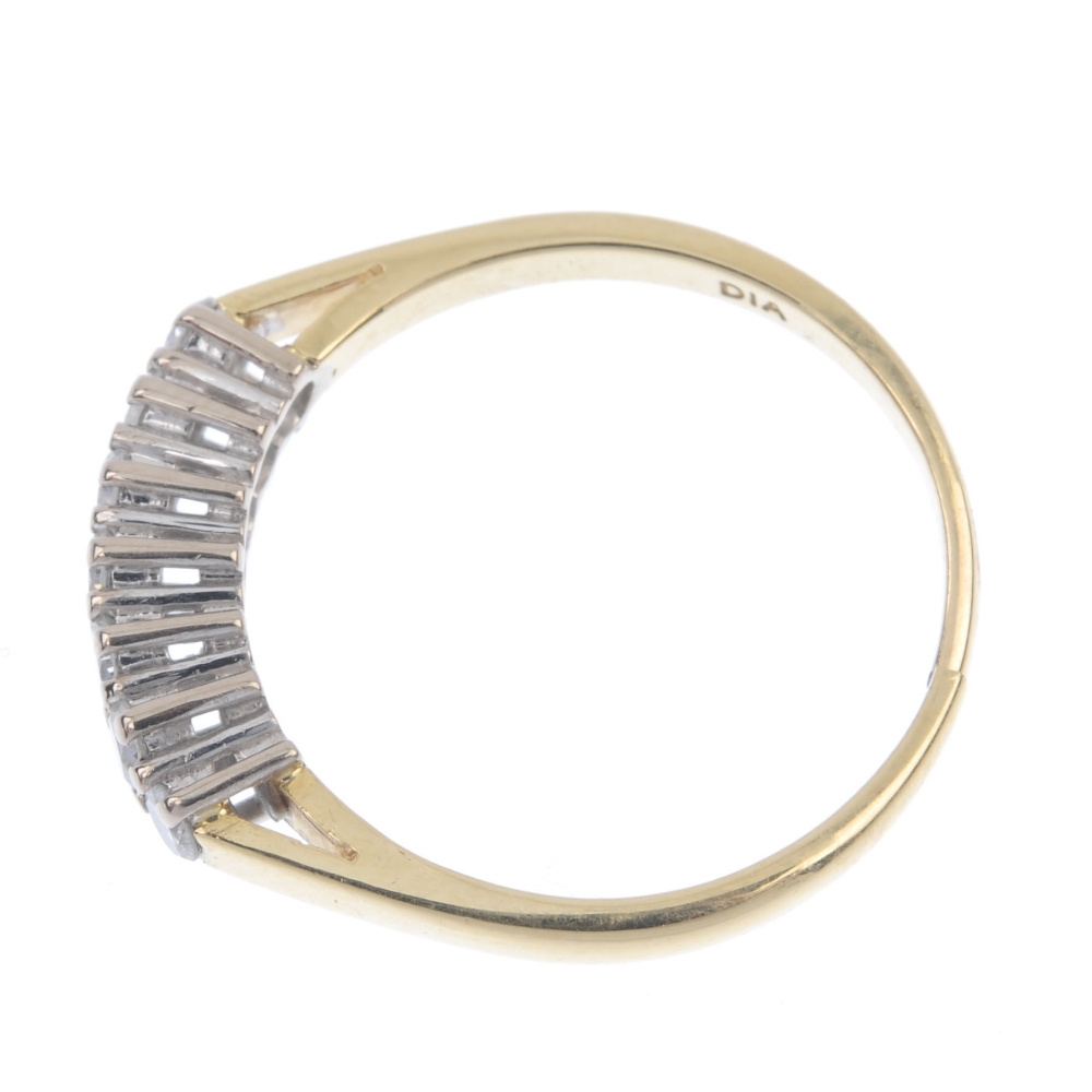 An 18ct gold diamond seven-stone ring. The brilliant-cut diamond line, to the plain band. - Image 3 of 4
