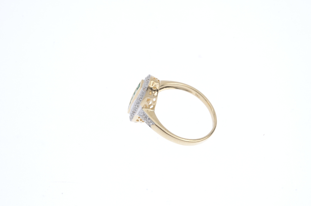 An 18ct gold emerald and diamond ring. The square-shape emerald line, within a channel-setting, to - Image 3 of 4