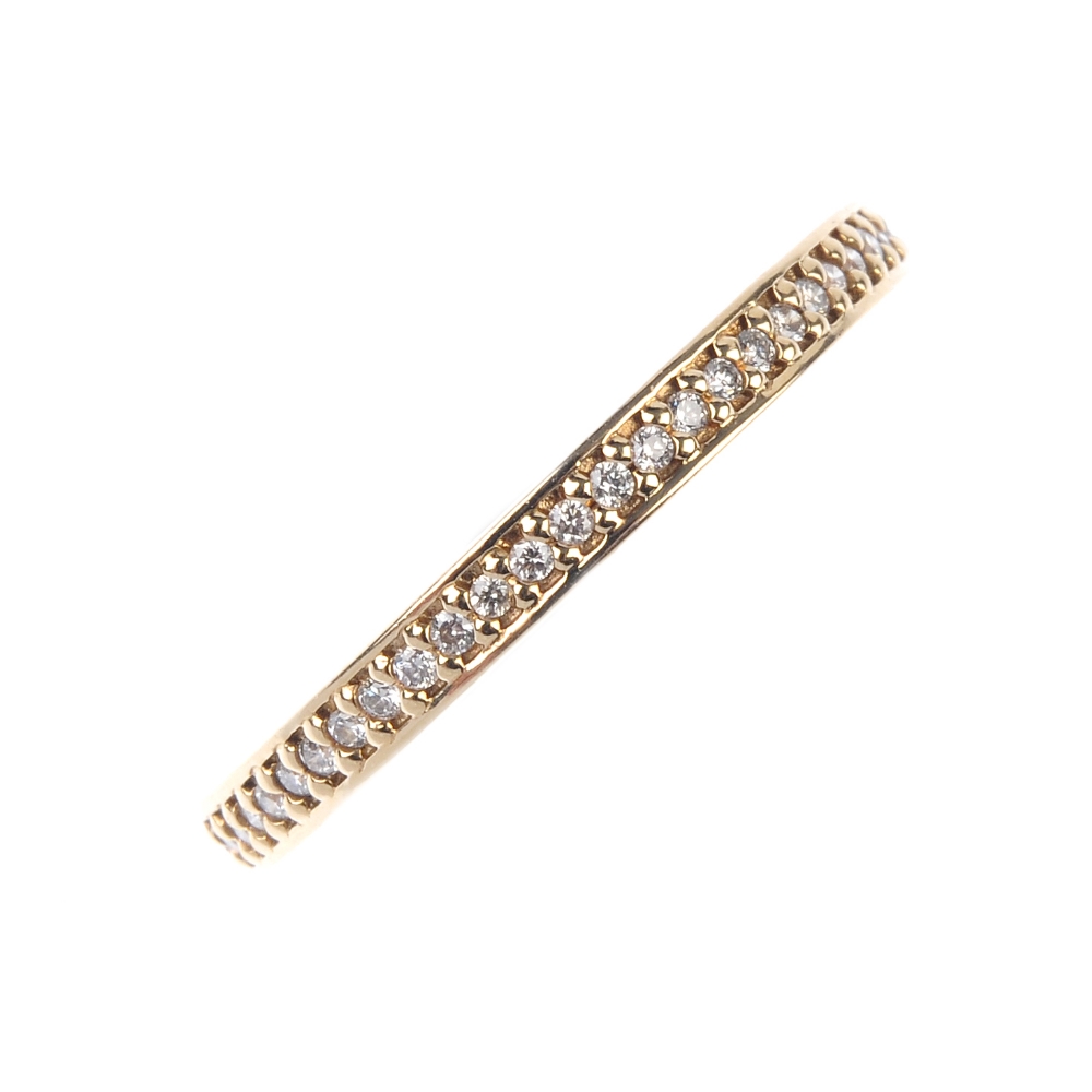 PANDORA - a 14ct gold diamond full-circle eternity ring. The brilliant-cut diamond line, with