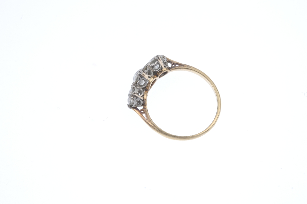 A mid 20th century 18ct gold and platinum diamond three-stone ring. The graduated old-cut - Image 3 of 4