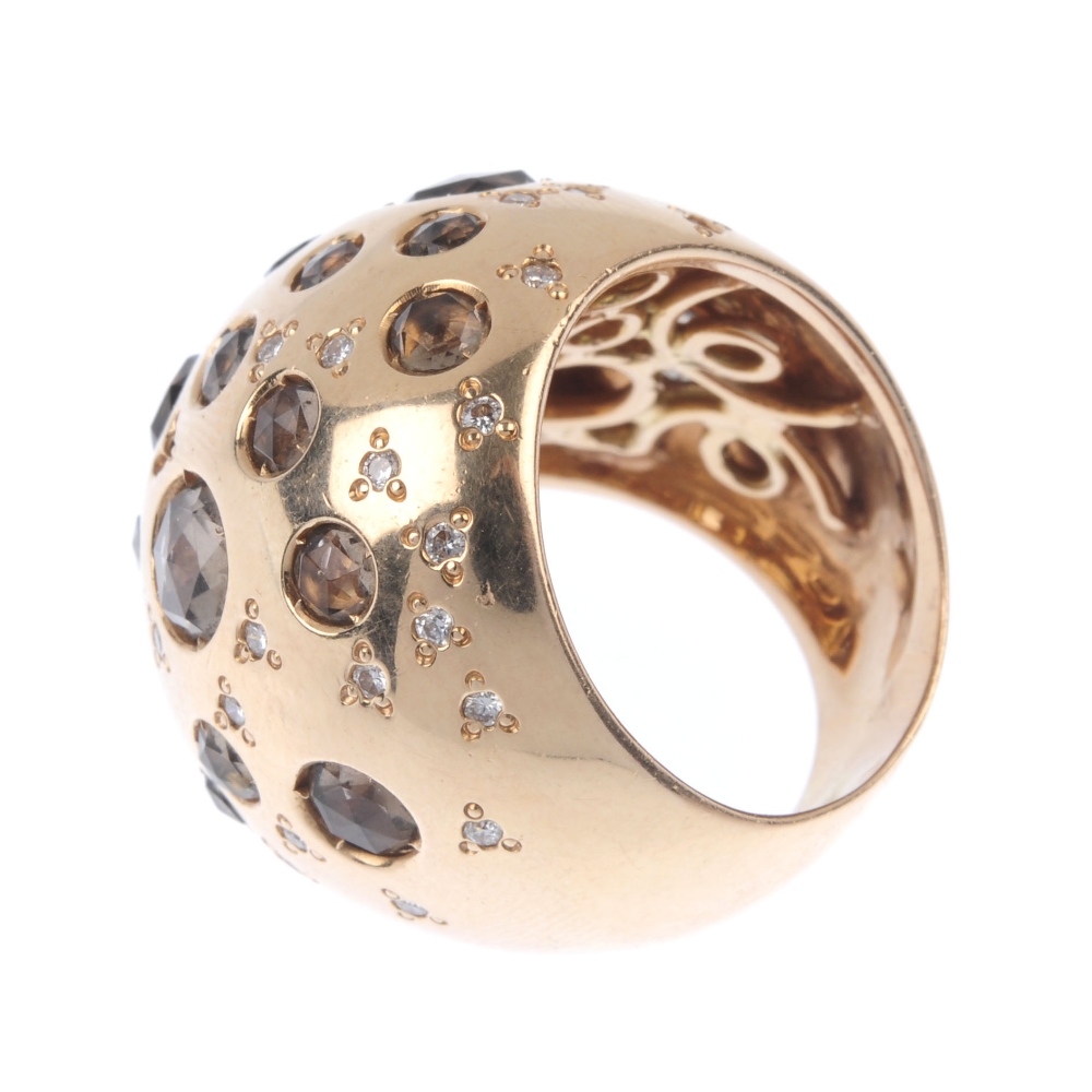 A quartz and diamond dress ring. Of abstract design, the vari-size circular-shape smoky quartz and - Image 3 of 4