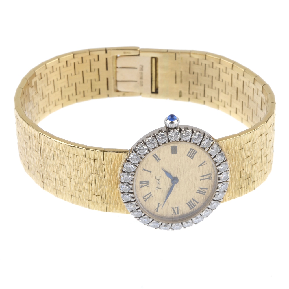 PIAGET - an 18ct gold diamond dress watch. The oval textured dial, with black Roman numerals, to the - Image 3 of 3