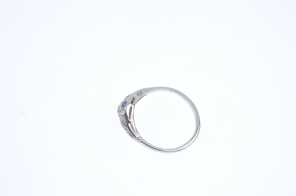 A diamond and sapphire dress ring. The old-cut diamond collet, within a similarly-set diamond and - Image 3 of 4