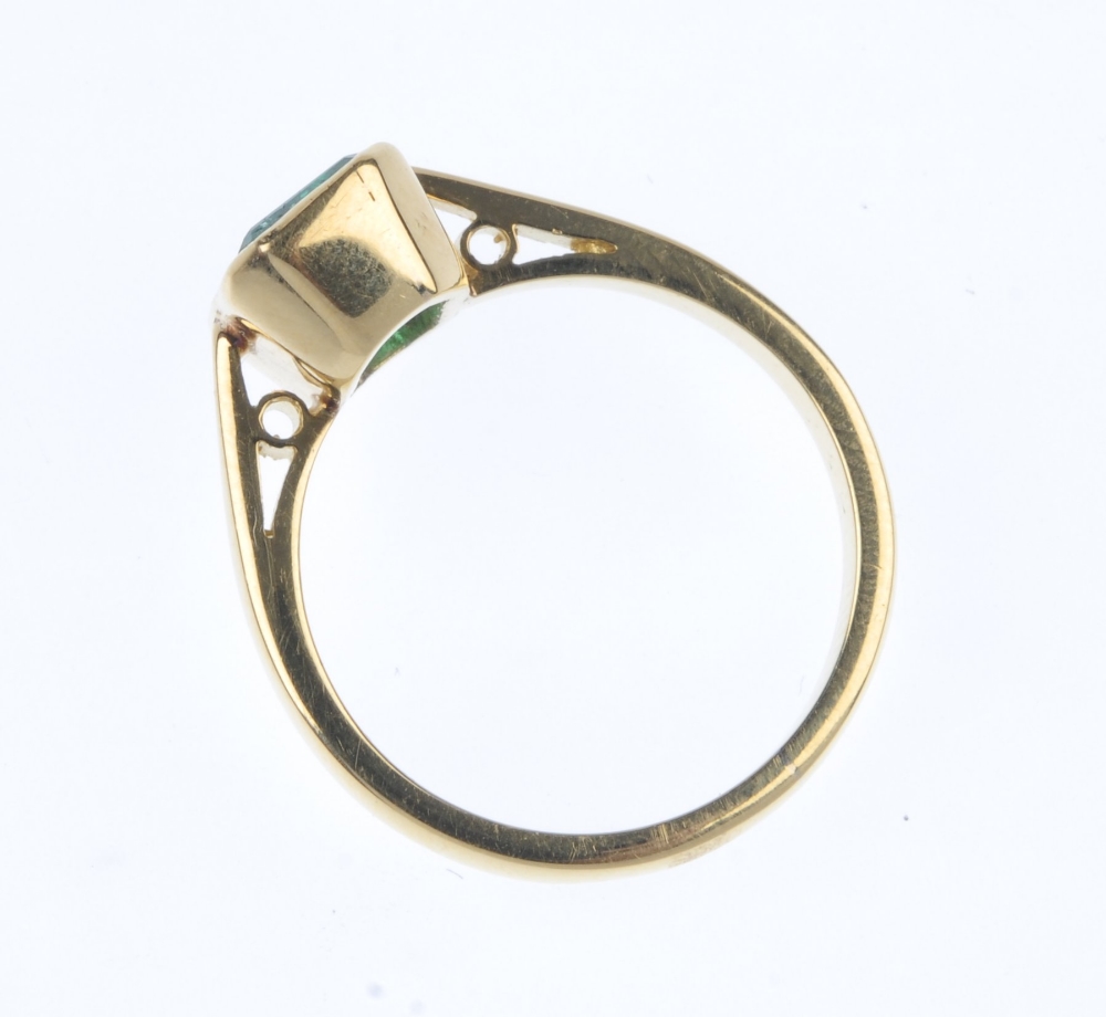 An 18ct gold emerald single-stone ring. The rectangular-shape emerald collet, to the tapered - Image 4 of 5