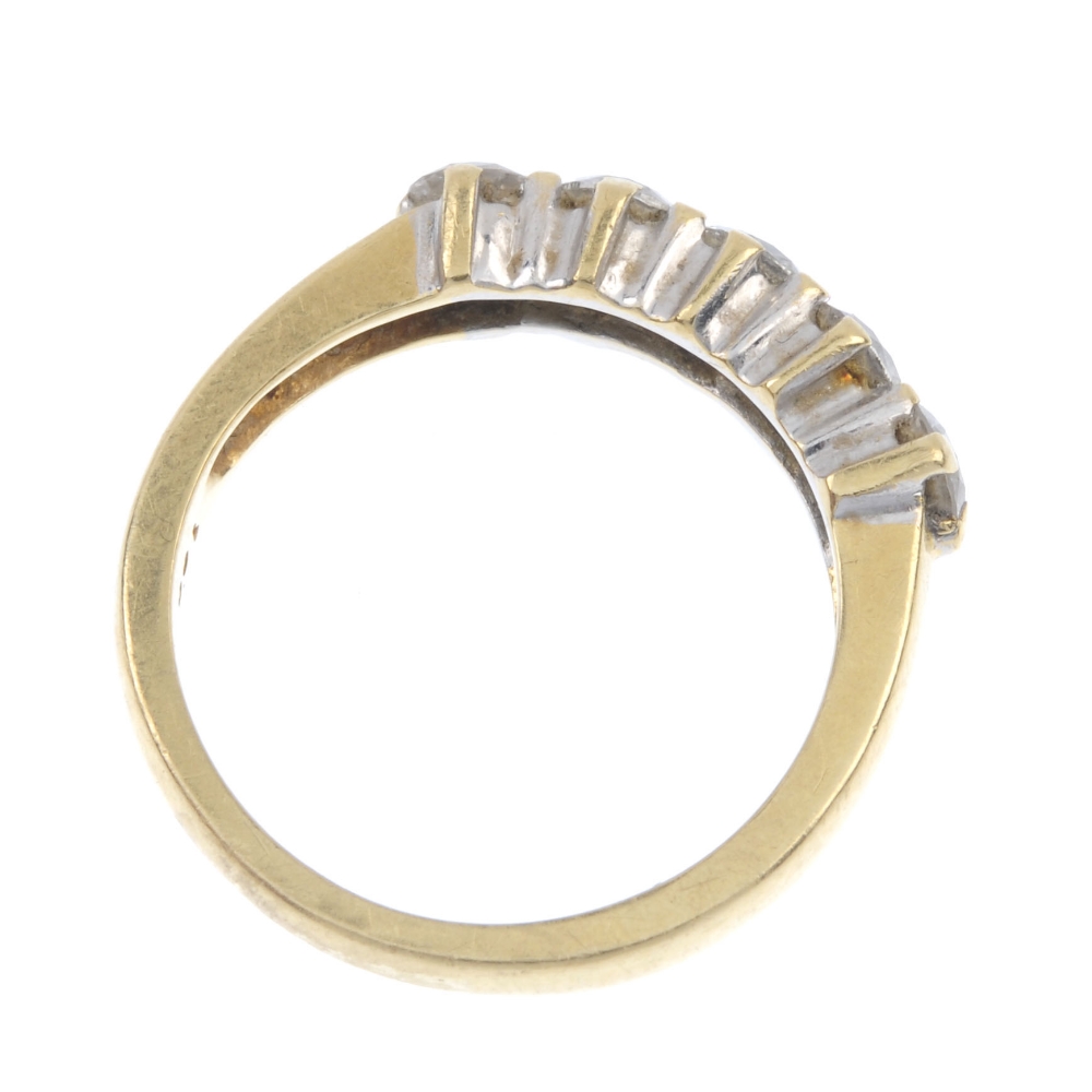 An 18ct gold diamond five-stone ring. The brilliant-cut diamond line, to the tapered band. Total - Image 4 of 4