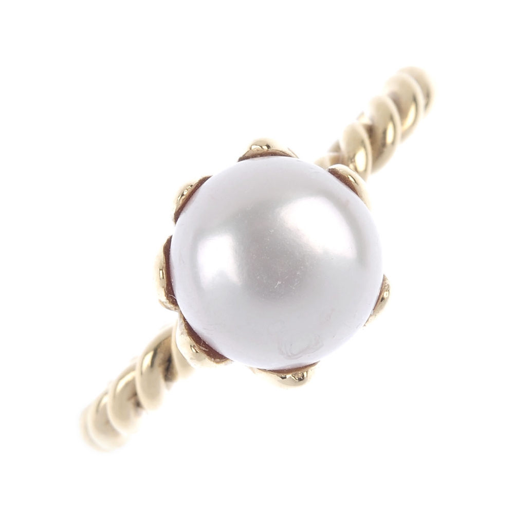 PANDORA - two 14ct gold rings. The first designed as a cultured pearl ring, with twist band, the