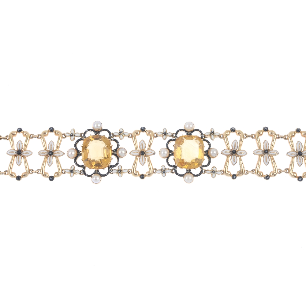 An early 20th century gold citrine, enamel and split pearl bracelet. Designed as two cushion-shape