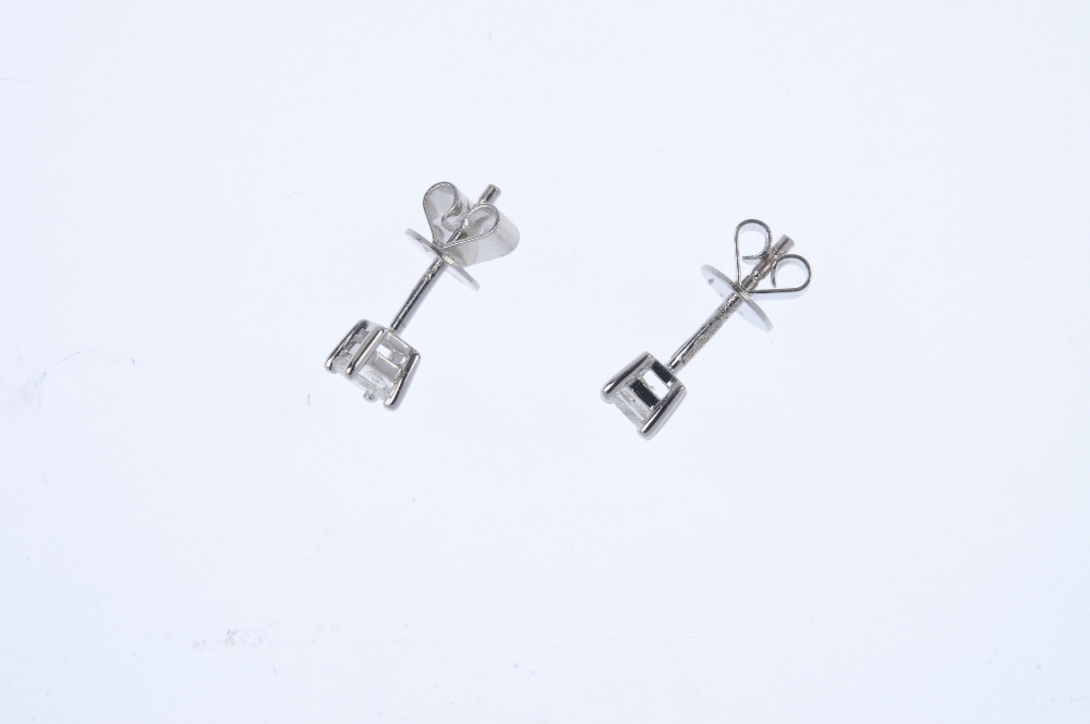 A pair of 18ct gold square-shape diamond single-stone ear studs. Total diamond weight 0.33ct, - Image 2 of 2