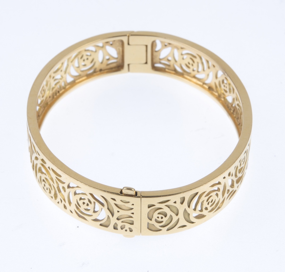 CHANEL - a 'Camelia' bangle. The hinged sides, each with pierced rose frieze. Signed and numbered - Image 3 of 3