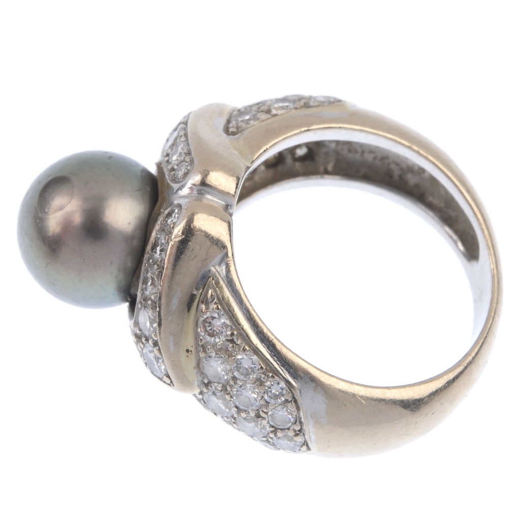 A cultured pearl and diamond dress ring. The grey cultured pearl, measuring approximately 10mms, - Image 3 of 4