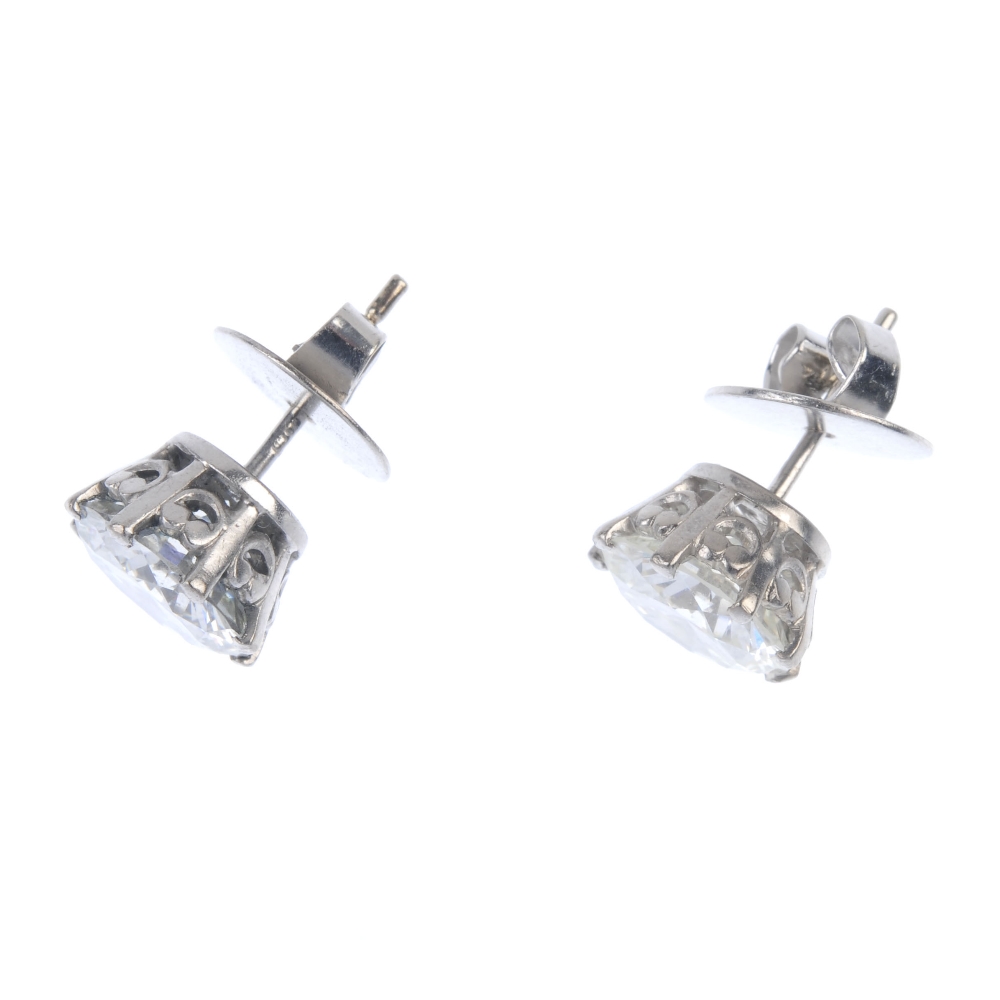 A pair of brilliant-cut diamond ear studs, weighing 2.02 and 2.04cts, respectively. Accompanied by - Image 2 of 4