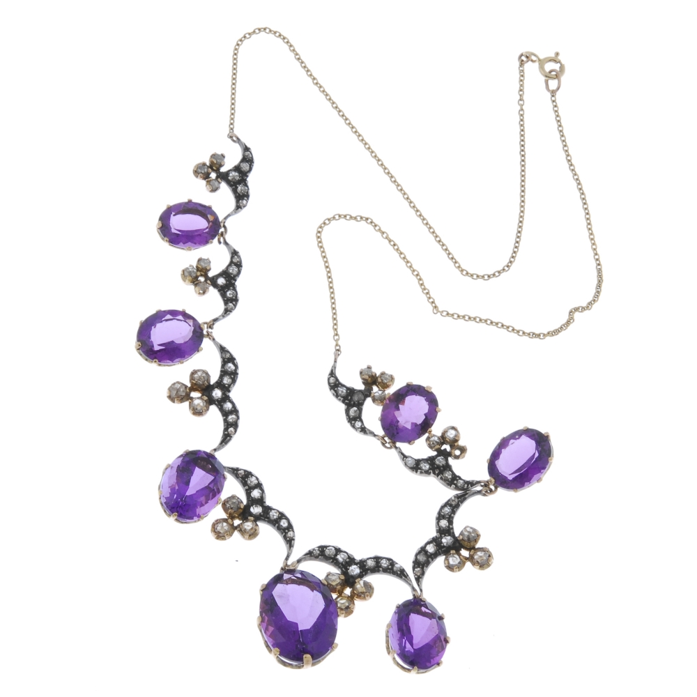 An amethyst and diamond necklace. The graduated oval-shape amethyst fringe, with similarly graduated - Image 4 of 4
