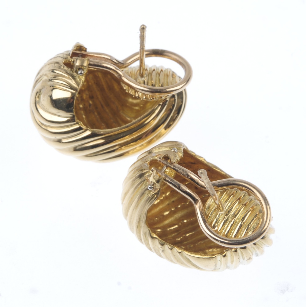 TIFFANY & CO. - a pair of 1970s earrings. Each designed as a grooved scrolling line panel. One - Image 3 of 3